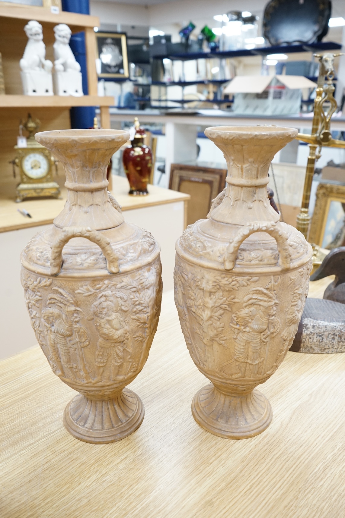 A pair of Grand Tour plaster two handled neoclassical revival vases H 43cm x 20cm